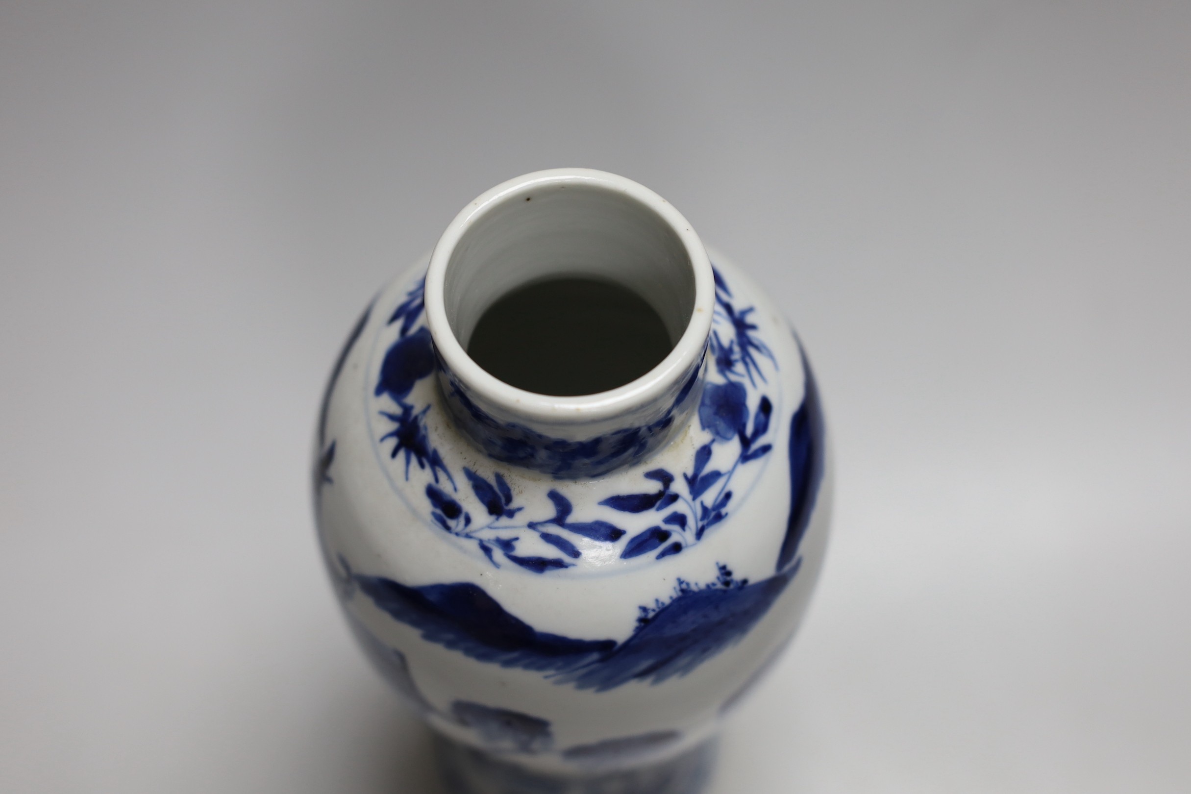 A 19th century Chinese blue and white baluster vase, 23cms high